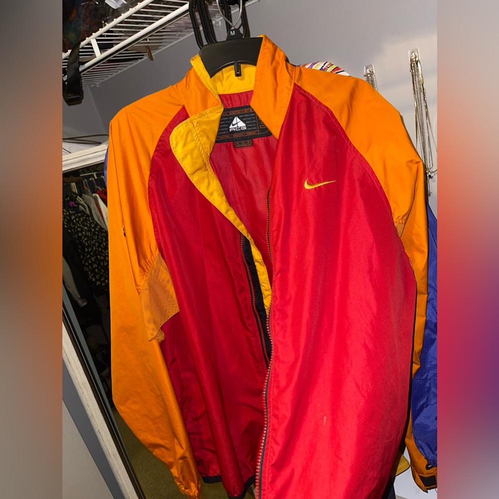 Red and yellow Nike windbreaker